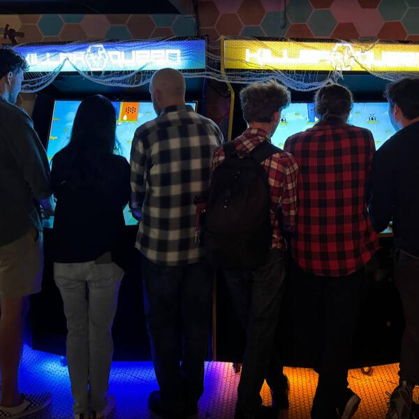 Utah crypto community members playing arcade games at VIP Gaming event at Quarters Arcade in Salt Lake City